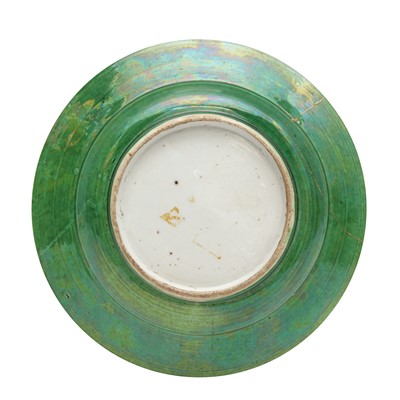 Lot 30 - A Chinese sancai-glazed biscuit 'prunus' dish, Qing dynasty, Kangxi period