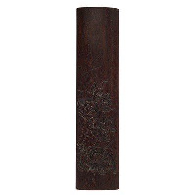Lot 210 - A fine Chinese zitan wood 'lotus and crab' wrist rest, 19th/20th century