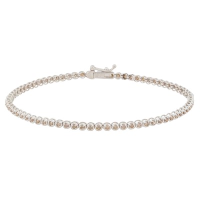 Lot 335 - A cognac diamond line bracelet