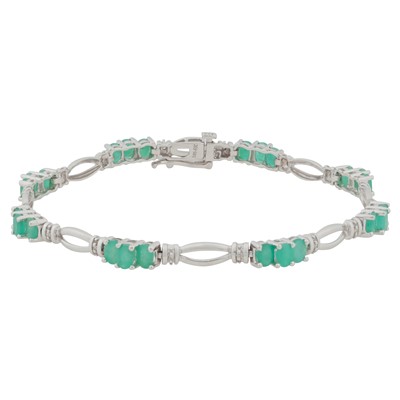 Lot 311 - An emerald and diamond bracelet