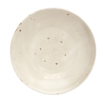 Lot 263 - A Chinese Cizhou white-glazed moulded dish, Song dynasty