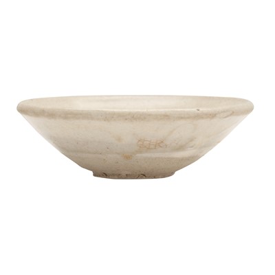 Lot 262 - A Chinese Cizhou-type white-glazed bowl, Song dynasty