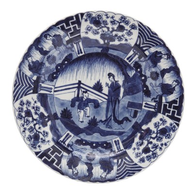 Lot 309 - A Chinese blue and white 'lady and boy' dish, Qing dynasty, 18th century