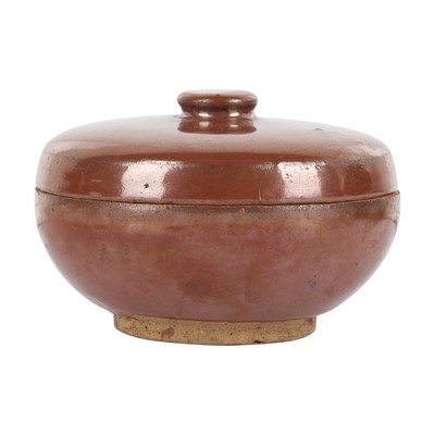 Lot 296 - A Chinese persimmon-glazed pot and cover, Ming dynasty