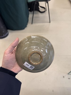 Lot 464 - A Chinese Yaozhou celadon 'peony' bowl, Northern Song dynasty