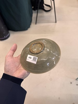 Lot 464 - A Chinese Yaozhou celadon 'peony' bowl, Northern Song dynasty