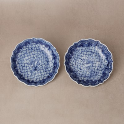 Lot 6 - A pair of Chinese blue and white 'crane' dishes, Qing dynasty, Shunzhi period