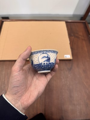 Lot 19 - A Chinese reticulated blue and white 'linglong' bowl, Qing dynasty, Ming dynasty, Chongzhen period