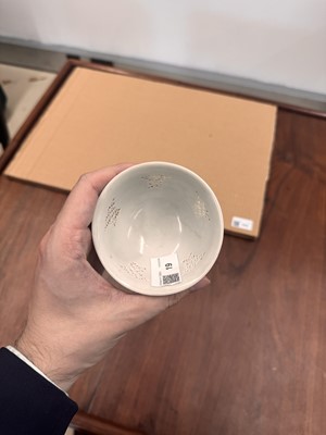 Lot 19 - A Chinese reticulated blue and white 'linglong' bowl, Qing dynasty, Ming dynasty, Chongzhen period