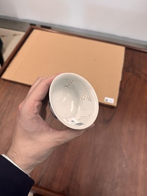 Lot 19 - A Chinese reticulated blue and white 'linglong' bowl, Qing dynasty, Ming dynasty, Chongzhen period