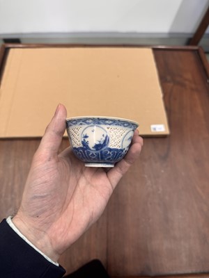 Lot 19 - A Chinese reticulated blue and white 'linglong' bowl, Qing dynasty, Ming dynasty, Chongzhen period