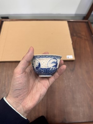 Lot 19 - A Chinese reticulated blue and white 'linglong' bowl, Qing dynasty, Ming dynasty, Chongzhen period