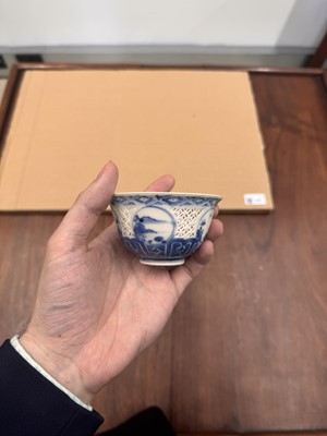 Lot 19 - A Chinese reticulated blue and white 'linglong' bowl, Qing dynasty, Ming dynasty, Chongzhen period