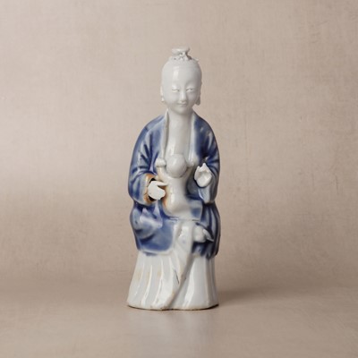 Lot 152 - A rare Chinese glazed-biscuit 'mother and child' figure group, Qing dynasty, Qianlong period