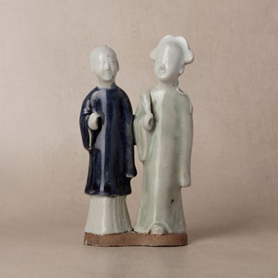 Lot 146 - A Chinese glazed-biscuit 'couple' figure group, Qing dynasty, Qianlong period