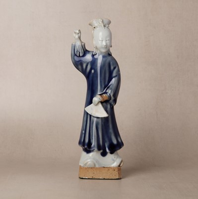 Lot 151 - A Chinese glazed-biscuit 'dancing lady' figure group, Qing dynasty, Qianlong period