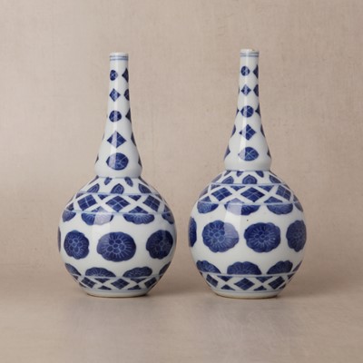 Lot 10 - Two rare Chinese export blue and white 'floral' sprinklers, Qing dynasty, Kangxi period
