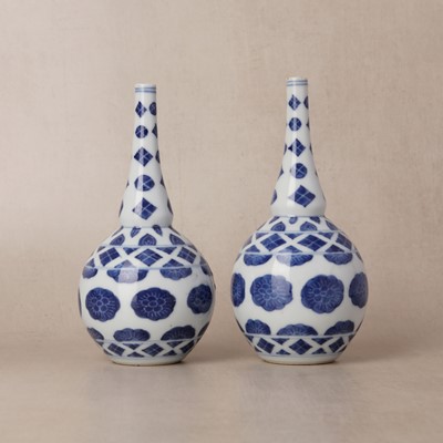Lot 10 - Two rare Chinese export blue and white 'floral' sprinklers, Qing dynasty, Kangxi period