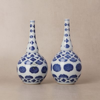 Lot 10 - Two rare Chinese export blue and white 'floral' sprinklers, Qing dynasty, Kangxi period