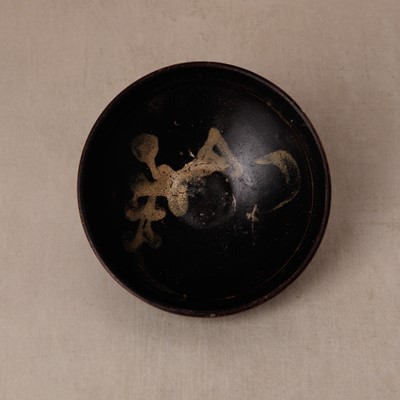 Lot 457 - A Chinese Jizhou glazed-glaze 'floral' painted bowl, Southern Song dynasty