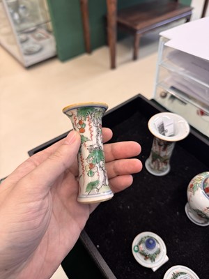 Lot 39 - A Chinese wucai 'squirrel and grapes' miniature garniture set, Transitional period