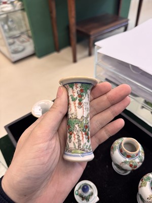Lot 39 - A Chinese wucai 'squirrel and grapes' miniature garniture set, Transitional period