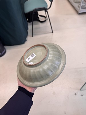 Lot 461 - A Chinese Longquan celadon 'twin fish' moulded dish, Song dynasty