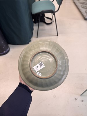 Lot 461 - A Chinese Longquan celadon 'twin fish' moulded dish, Song dynasty