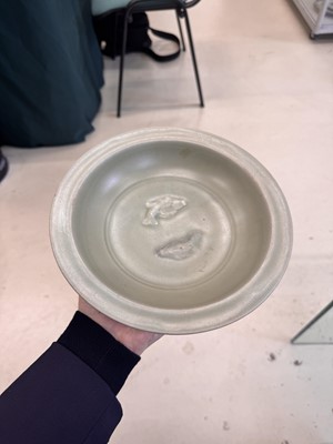 Lot 461 - A Chinese Longquan celadon 'twin fish' moulded dish, Song dynasty