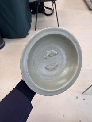 Lot 461 - A Chinese Longquan celadon 'twin fish' moulded dish, Song dynasty