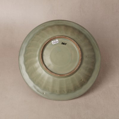 Lot 461 - A Chinese Longquan celadon 'twin fish' moulded dish, Song dynasty