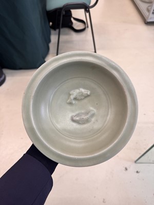 Lot 461 - A Chinese Longquan celadon 'twin fish' moulded dish, Song dynasty