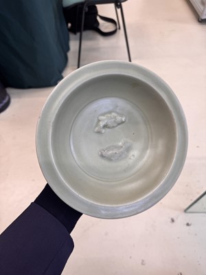 Lot 461 - A Chinese Longquan celadon 'twin fish' moulded dish, Song dynasty