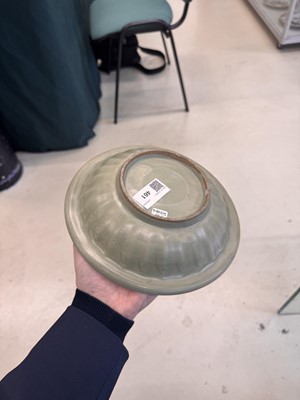Lot 461 - A Chinese Longquan celadon 'twin fish' moulded dish, Song dynasty