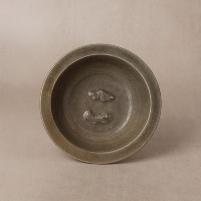 Lot 459 - A Chinese Longquan celadon 'twin fish' moulded dish, Song/Ming dynasty