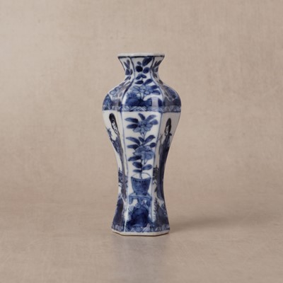 Lot 14 - A small Chinese blue and white 'lady' hexagonal vase, Qing dynasty, Kangxi period
