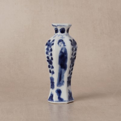 Lot 11 - A small Chinese blue and white 'lady' hexagonal vase, Qing dynasty, Kangxi period