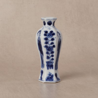 Lot 11 - A small Chinese blue and white 'lady' hexagonal vase, Qing dynasty, Kangxi period