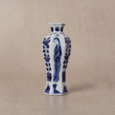 Lot 11 - A small Chinese blue and white 'lady' hexagonal vase, Qing dynasty, Kangxi period