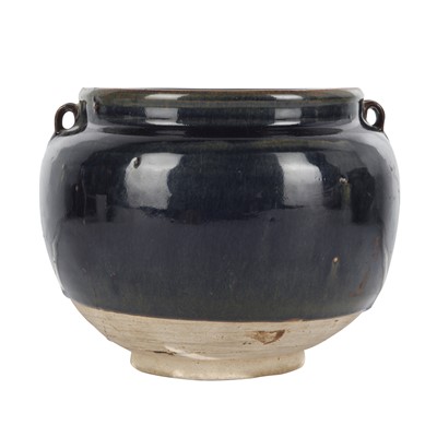Lot 278 - A Chinese Cizhou black-glazed twin-handled jar, Song dynasty
