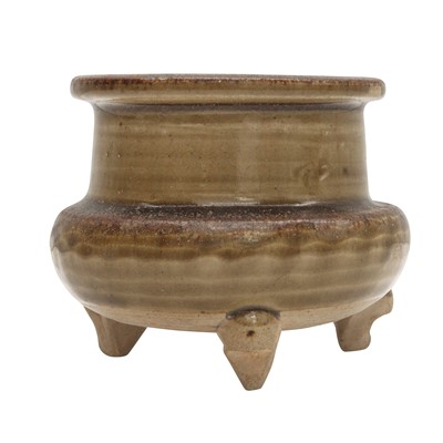 Lot 297 - A Chinese green-glazed tripod censer, Ming dynasty or earlier