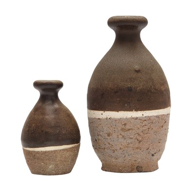 Lot 245 - Two Chinese slip-decorated brown-glazed garlic-mouth vases, Tang dynasty