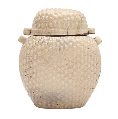 Lot 265 - A Chinese white-glazed 'basket weave' jar and cover, Song dynasty