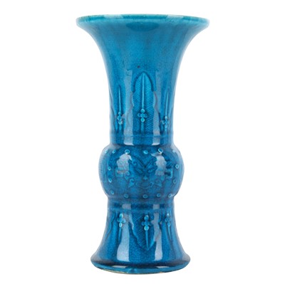 Lot 74 - A Chinese monochrome turquoise-glazed incised 'gu' vase, Qing dynasty, 18th century