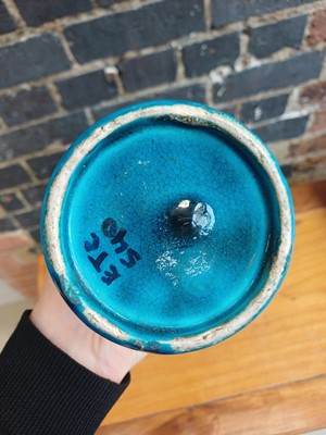 Lot 74 - A Chinese monochrome turquoise-glazed incised 'gu' vase, Qing dynasty, 18th century