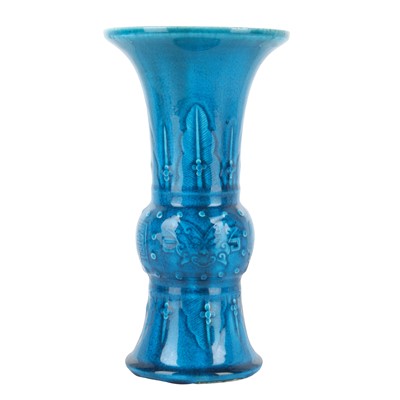 Lot 74 - A Chinese monochrome turquoise-glazed incised 'gu' vase, Qing dynasty, 18th century