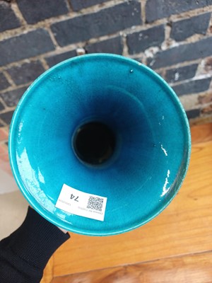 Lot 74 - A Chinese monochrome turquoise-glazed incised 'gu' vase, Qing dynasty, 18th century