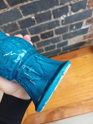 Lot 74 - A Chinese monochrome turquoise-glazed incised 'gu' vase, Qing dynasty, 18th century
