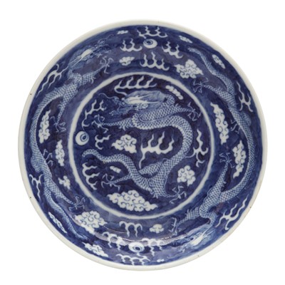 Lot 62 - A Chinese blue and white 'dragon' dish, Qing dynasty, Guangxu mark and of the period