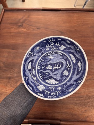 Lot 62 - A Chinese blue and white 'dragon' dish, Qing dynasty, Guangxu mark and of the period